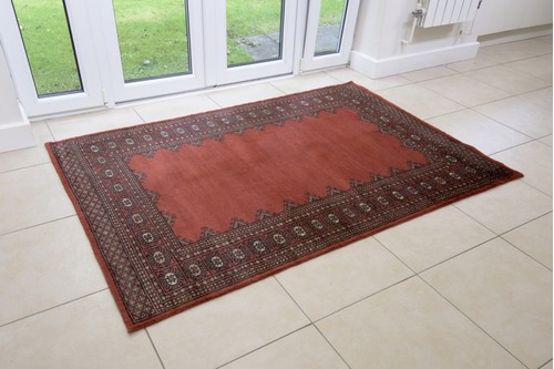 100% Wool Rust Fine Pakistan Bokhara Rug Design Handknotted in Pakistan with a 10mm pile